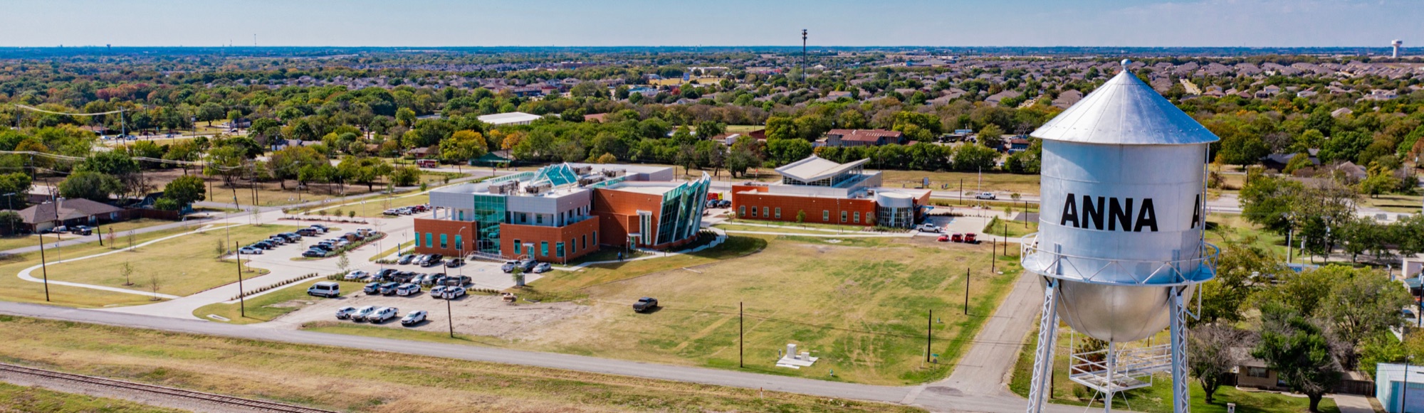 Aerial view of Anna, Texas, with the town's water tower in the foreground